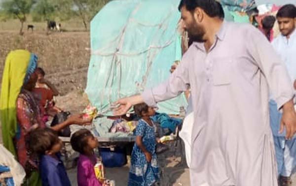 ehasn charity flood relief work in pakistan